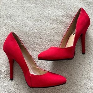 Bright red closed toe heels